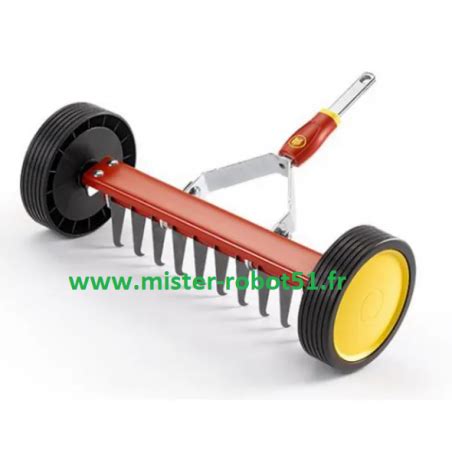 Schéma technique montrant le système de montage du scarificateur Outils Wolf URM30 sur son manche Multistar