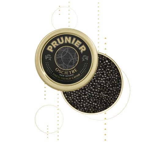 Une boîte de caviar Prunier ouverte, révélant des perles de caviar brillantes.