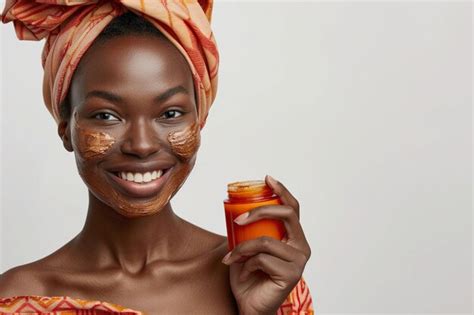 Jeune femme appliquant une lotion capillaire à base d'ortie