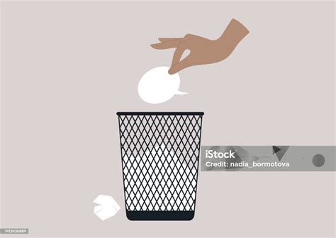 Image symbolique : une main jetant un déchet dans une grille d'avaloir