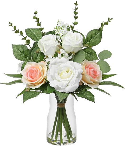 disposition de différentes couleurs de clématites artificielles dans un vase