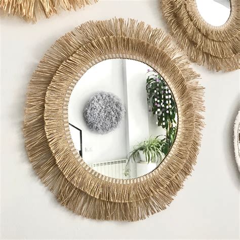 miroir décoré de corde de jute et coquillages