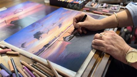 Artiste utilisant des pastels carrés