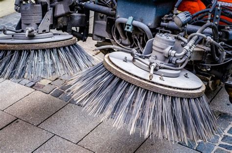 Schéma expliquant le mécanisme de rotation des brosses d'une balayeuse manuelle