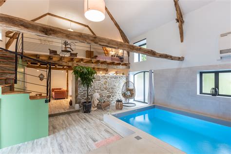 Vue intérieure d'une chambre du gîte avec literie confortable