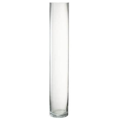 Vase cylindrique transparent avec du lierre et des fleurs