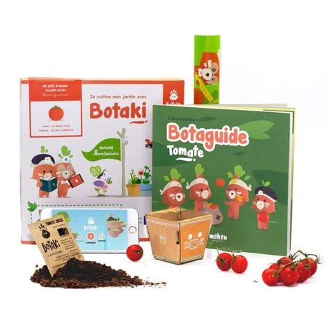 Enfant jardinant avec le kit de tomates cerises