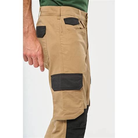 Détails des poches et renforts en Cordura sur un pantalon de jardinier
