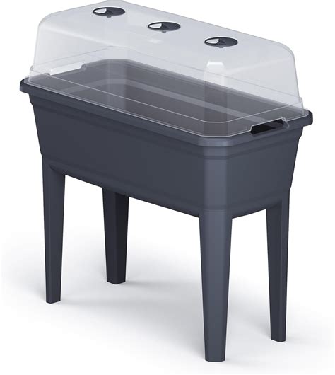 Jardinière surélevée en plastique avec différentes plantations