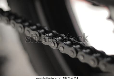 Close-up of a well-lubricated motorcycle chain