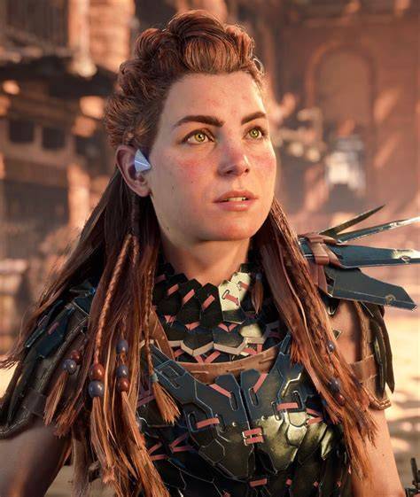 Aloy grimpe une paroi rocheuse dans Horizon Forbidden West