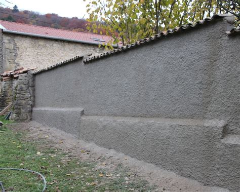 une image représentant un mur mitoyen avec des flèches indiquant le paiement pour le partage