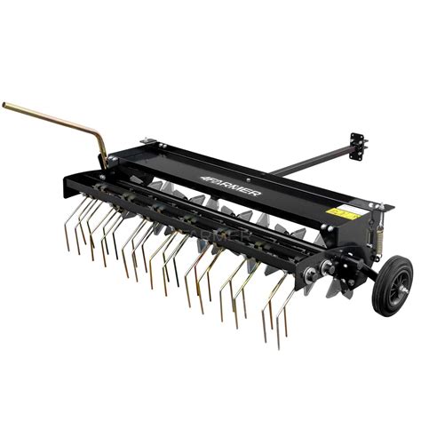 scarificateur tracteur tondeuse en action