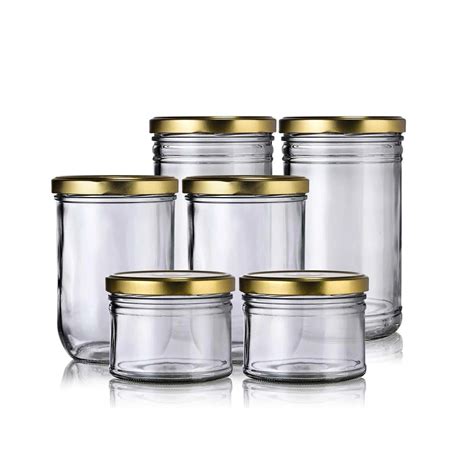 pots et bocaux en verre avec des plantes