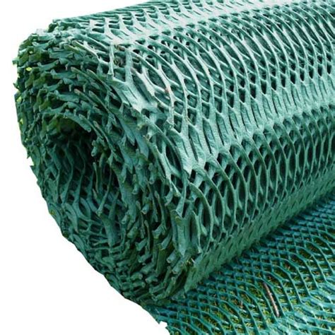 Détail technique d'une grille de renforcement pour gazon avec système de loquets