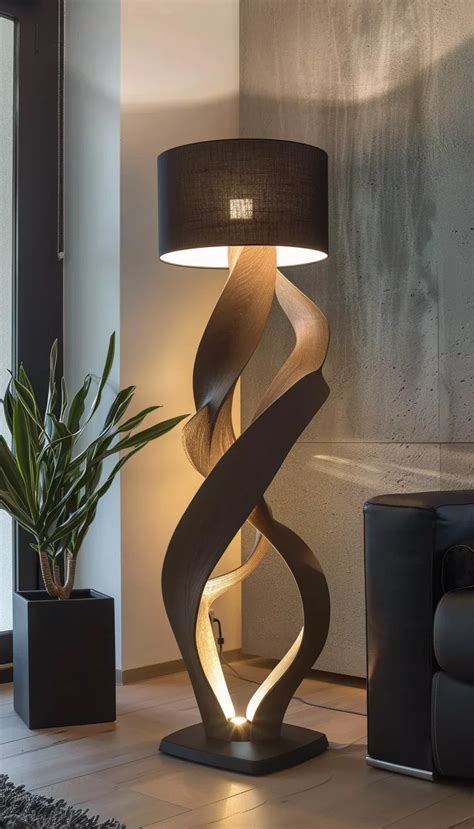 une lampe au design naturel ornée de feuilles de lierre entrelacées sur son support