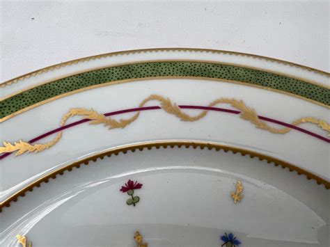 Assiettes en porcelaine de Limoges Haviland bordure dorée