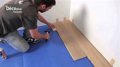 Exemple de pose flottante de lames stratifiées dans une cuisine moderne