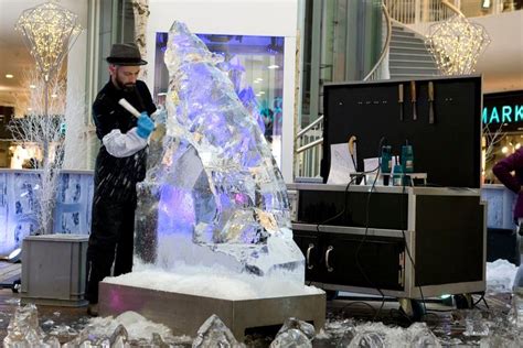 Ambiance nocturne du Starlight Gala avec sculptures de glace et buffet gastronomique
