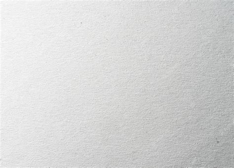 Photo de détails montrant la texture du papier matiéré de l'album