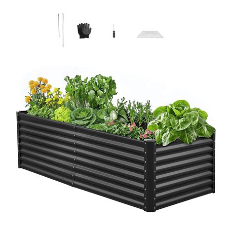 Potager surélevé à fond ouvert en cours de remplissage