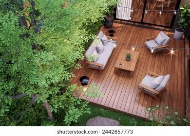 Vue aérienne d'un jardin paysager luxuriant avec mobilier de terrasse