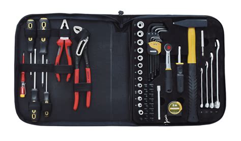 trousse d'outils complète pour bonsaï ouverte sur une table