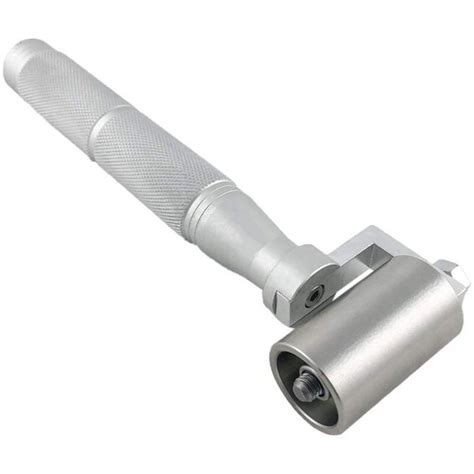 Rouleau perceur manuel