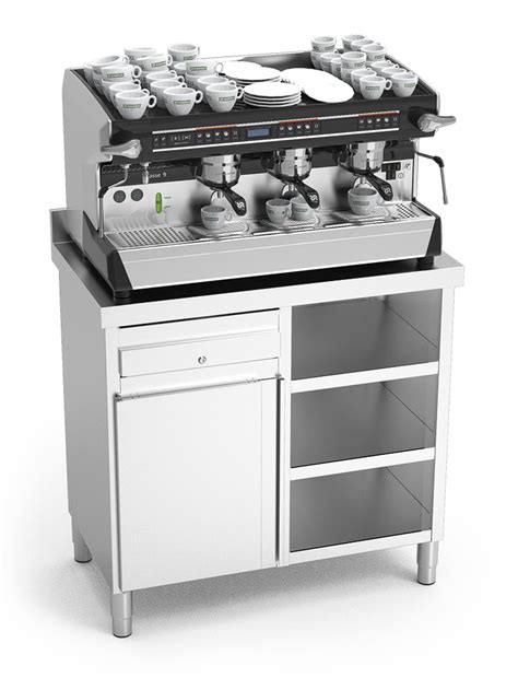 une station de café professionnelle propre avec un bac à marc en acier inoxydable