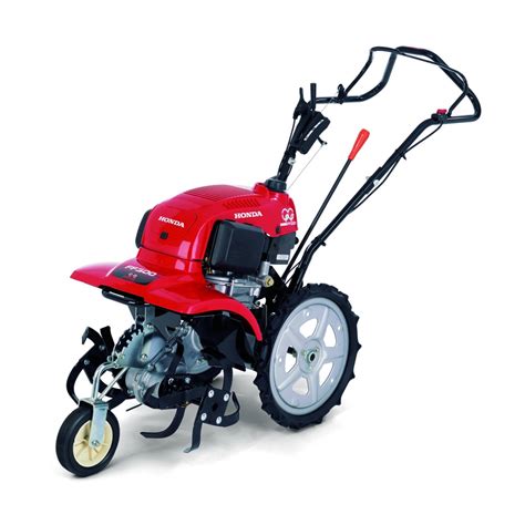 Motobineuse Honda FF 300 en action dans un potager bien entretenu