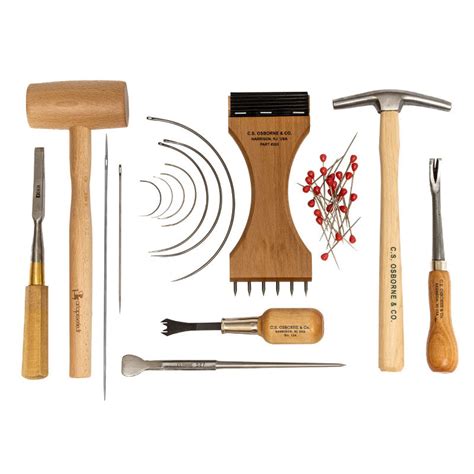 Outils de tapissier, incluant des clous de tapissier