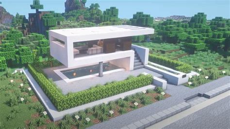 Exemple d'une maison Minecraft bien protégée avec des rebords et un aménagement paysager