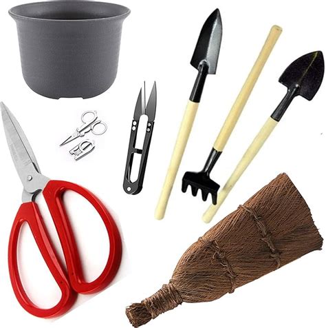 Trousse de rangement ouverte montrant des outils de bonsaï nettoyés et organisés