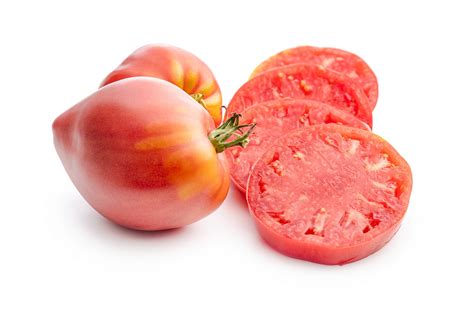 gros plan sur une récolte d'abricots mûrs avec la mention 'Tomate coeur de boeuf' en référence à la qualité de la sélection