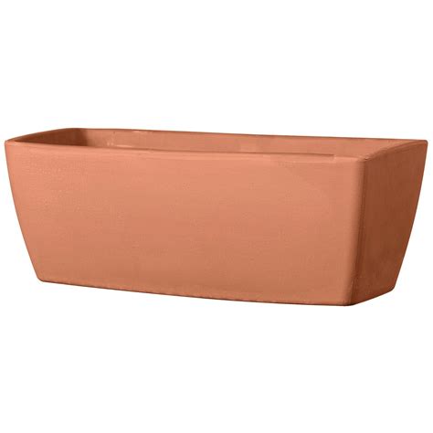 détail de la texture de l'émail sur une jardinière en terre cuite