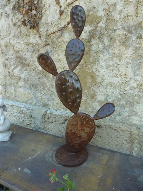 Sculpture de jardin en métal rouillé
