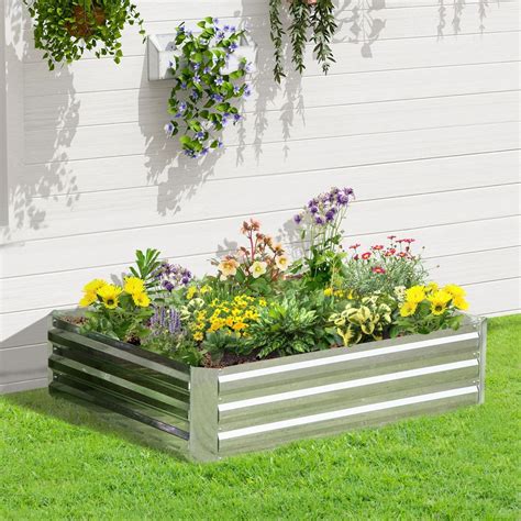 Illustration d'un carré potager surélevé organisé en grille de plantation