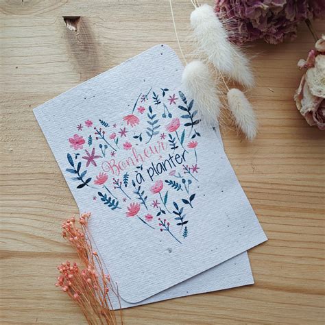Illustration d'une carte à planter ensemencée avec des fleurs sauvages