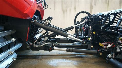 Photo détaillée du système de changement rapide de rotor sur un scarificateur Honda