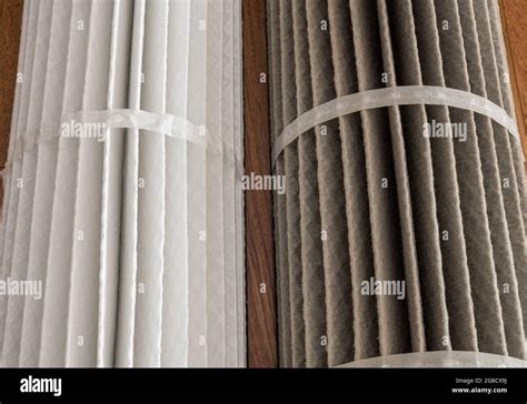 Comparatif visuel entre un filtre à air propre et un filtre à air saturé de poussières