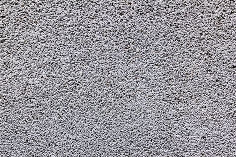Gros plan sur la texture du béton drainant
