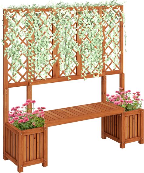 jardinière avec banc et treillis dans un jardin fleuri