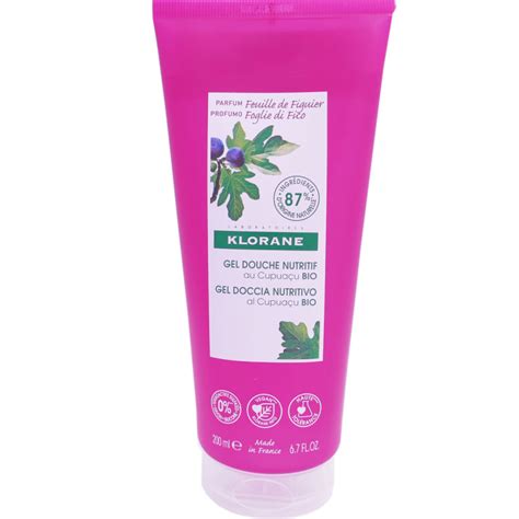 Flacon de Klorane Gel Douche Feuille de Figuier entouré de feuilles de figuier