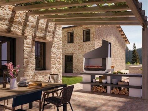 Terrasse panoramique avec barbecue et salon de jardin