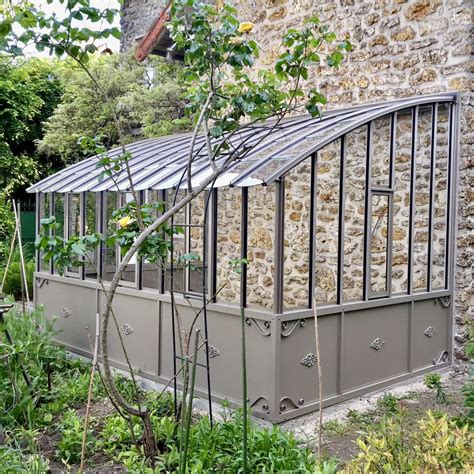 Serre adossée à un poulailler