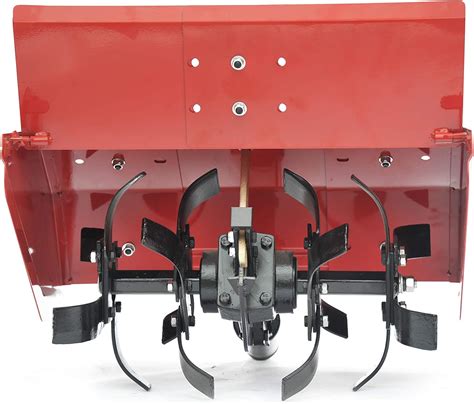 Vue éclatée d'une fraise de motoculteur montrant l'arbre, les supports et les couteaux