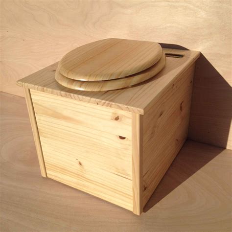 Plan de construction d'une toilette sèche en bois avec seau amovible