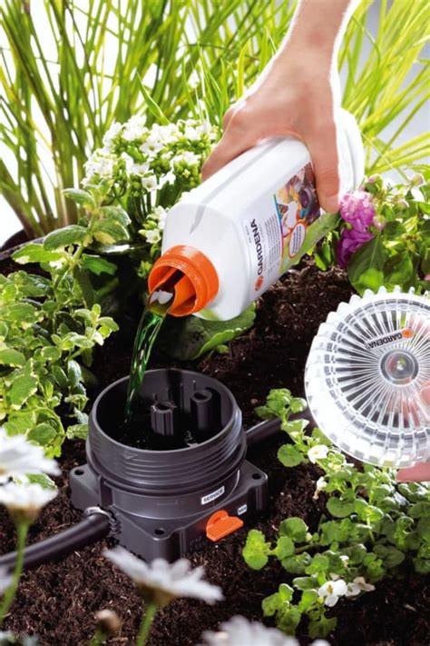 Distributeur d'engrais Gardena en action