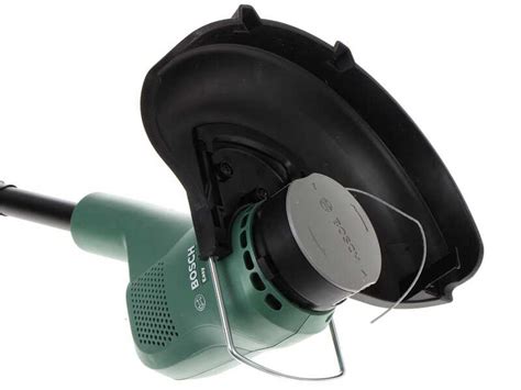 Schéma technique d'un coupe-bordures Bosch ART 23 montrant la tête de coupe et la bobine