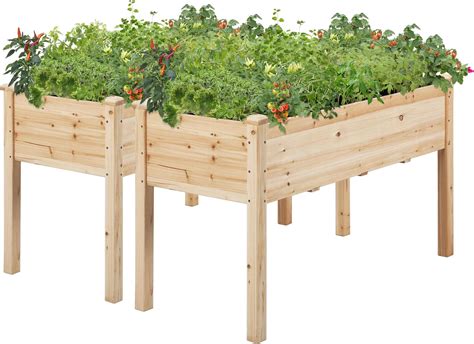 Illustration d'une terrasse aménagée avec des jardinières surélevées et des plantes aromatiques